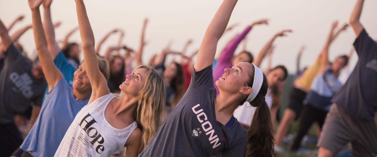 Yoga on Horsebarn Hill on Sept. 2, 2016. (Ryan Glista/UConn Photo)